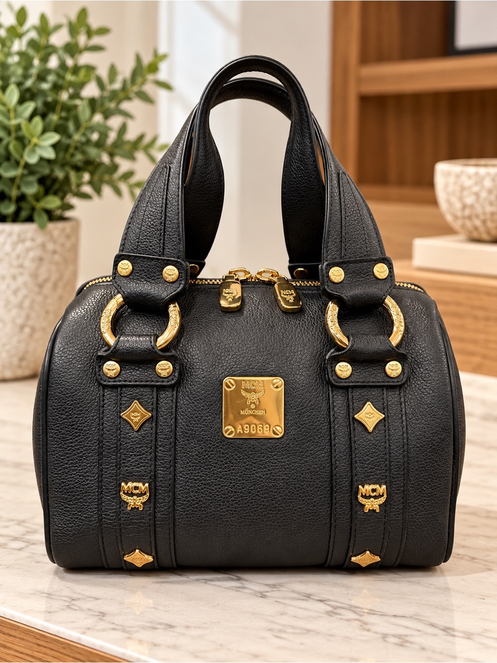MCM Mini Boston Black Pebbled Leather Satchel with Gold Hardware
